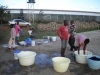 Children washing clothes